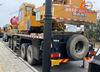 Une grue de camion de 50 tonnes Sany usagée fabriquée en 2023 en excellent état.
