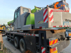 Grue de camion d'occasion Zoomlion 2021, 25 tonnes, flèche à 5 sections, fiable, à prix raisonnable.